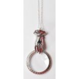 SILVER MAGNIFYING GLASS PENDANT