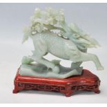 20TH CENTURY CHINESE ORIGINAL GREEN HARD STONE CARVED FIGURINE OF A QILIN