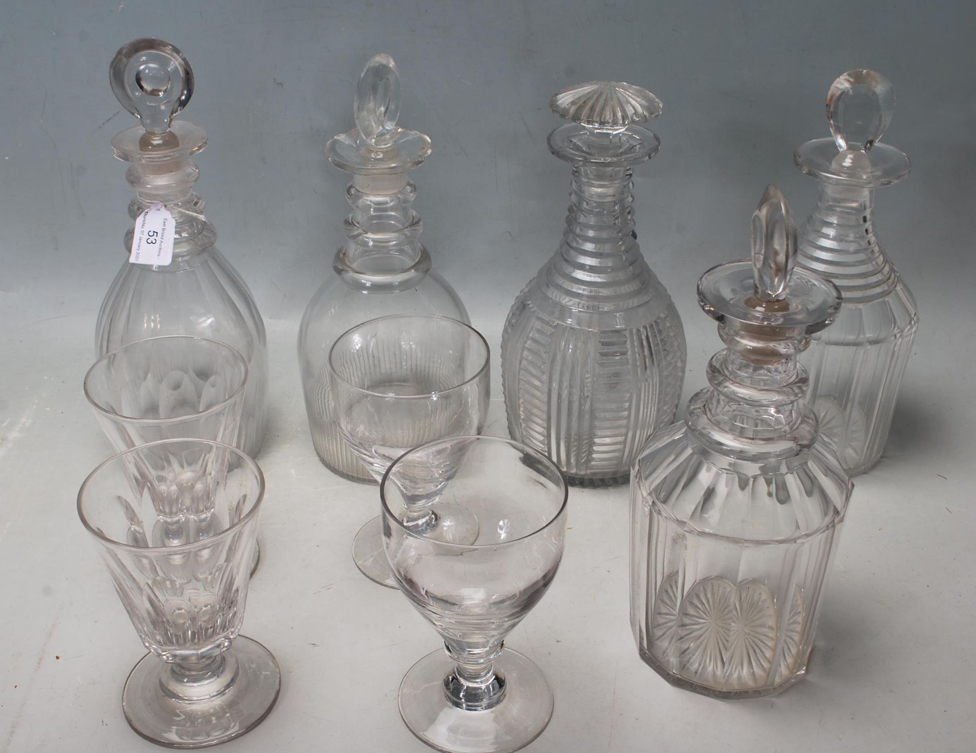 FIVE 18TH CENTURY GEORGIAN GLASS DECANTERS AND VICTORIAN DRINKING GLASSES