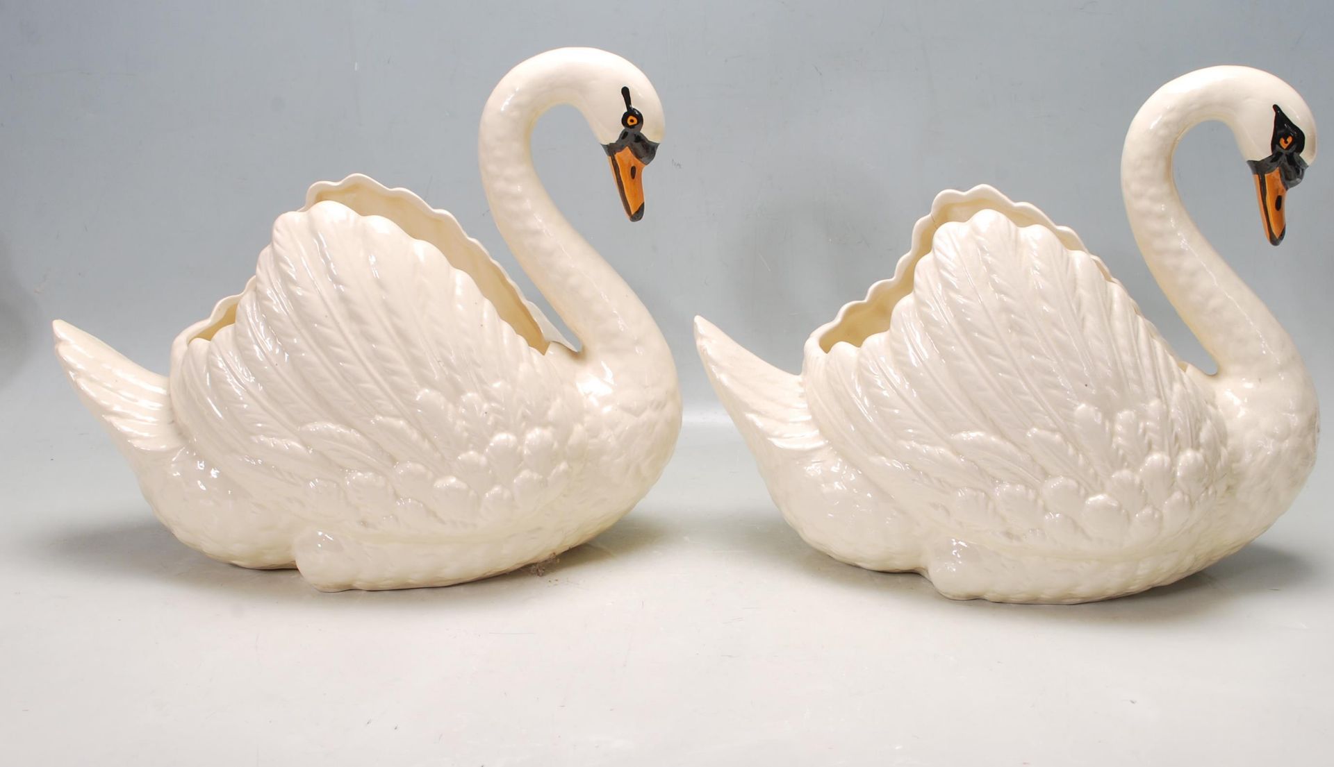 PAIR OF CERMAIC DARTMOUTH SWAN PLANTER