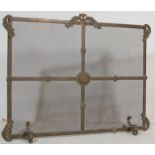 EARLY 20TH CENTURY BRASS AND MESH FIRE SCREEN