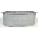 A RETRO 20TH CENTURY RECLAMATION YARD GALVANISED BATH