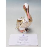 ROYAL CROWN DERBY WHITE PELICAN PAPERWEIGHT WITH GOLD STOPPER