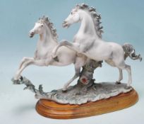 1980'S GIUSEPPE ARMANI PAIR OF HORSES FIGURINE