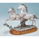 1980'S GIUSEPPE ARMANI PAIR OF HORSES FIGURINE