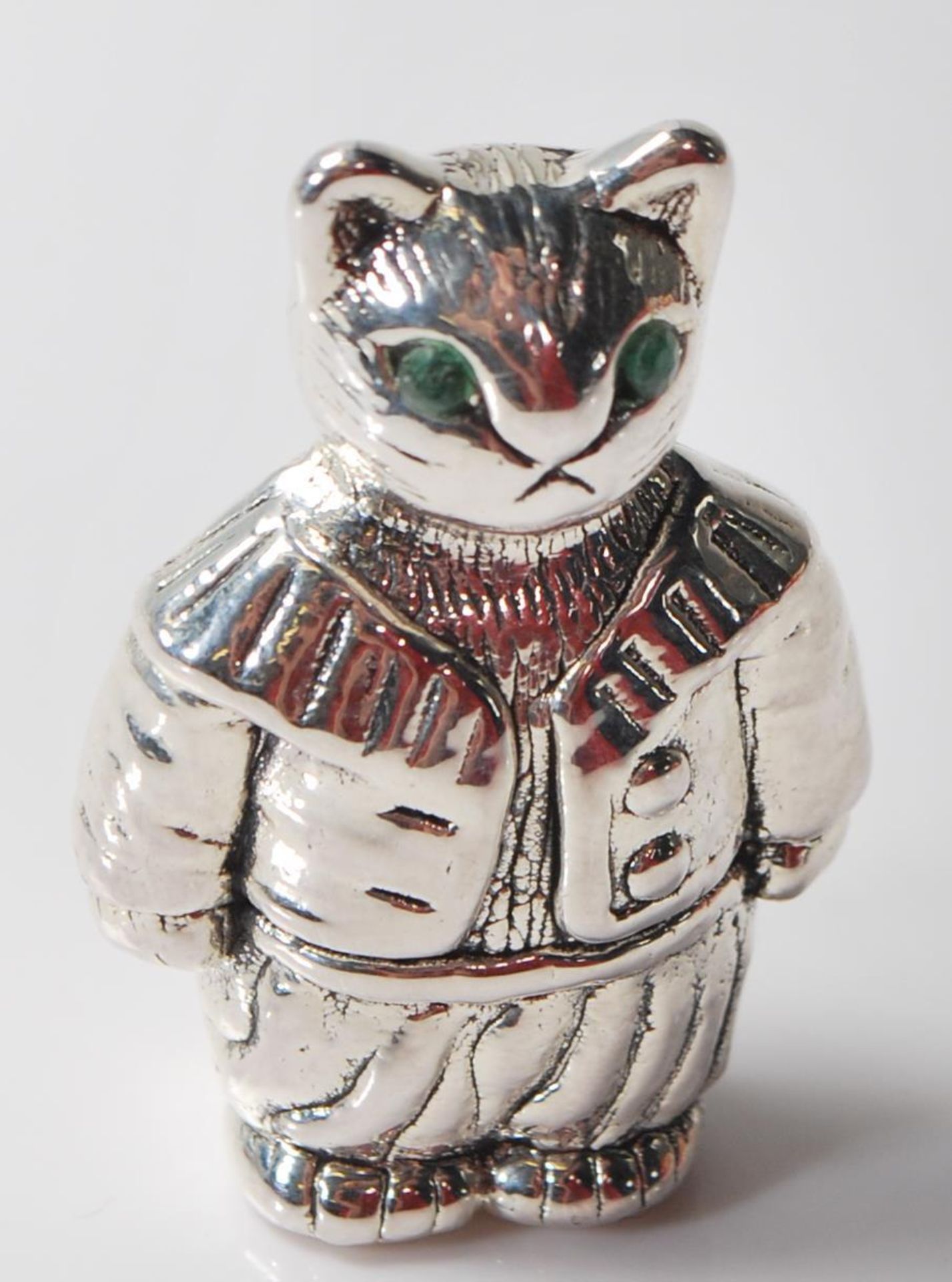 TOM KITTEN SILVER PIN CUSHION WITH GREEN EYES