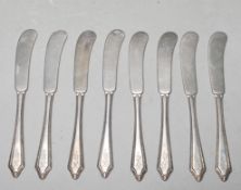 SET OF NINE AMERICAN SILVER BUTTER KNIVES