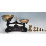 SET OF EARLY 20TH CENTURY LIBRASCO CAST IRON AND BRASS SCALES.
