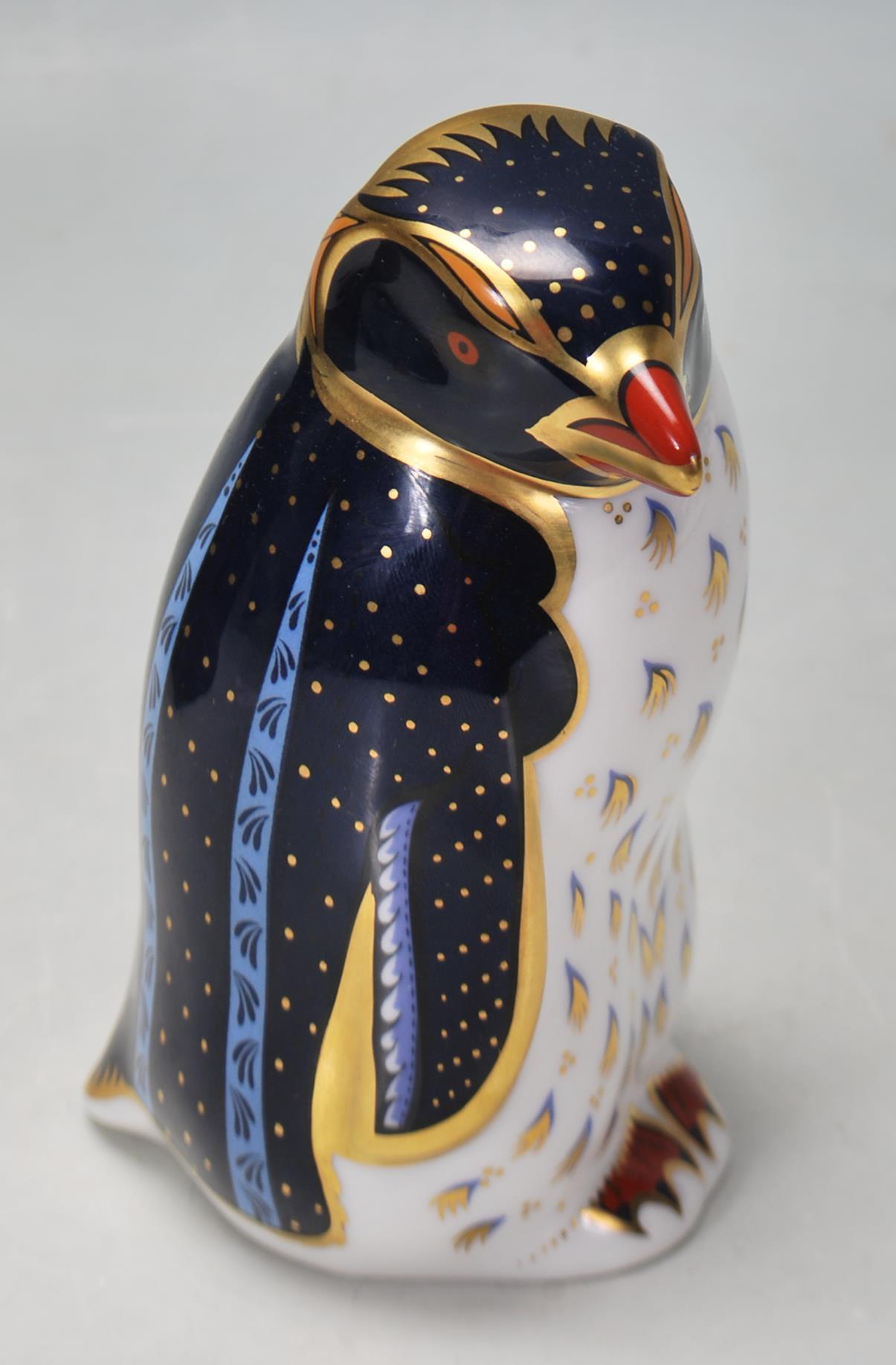 A ROYAL CROWN DERBY ROCKHOPPER PENGUIN PAPERWEIGHT WITH GOLD STOPPER - Image 3 of 7