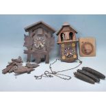 TWO EARLY 20TH CENTURY GERMAN BLACK FOREST CUCKOO CLOCKS