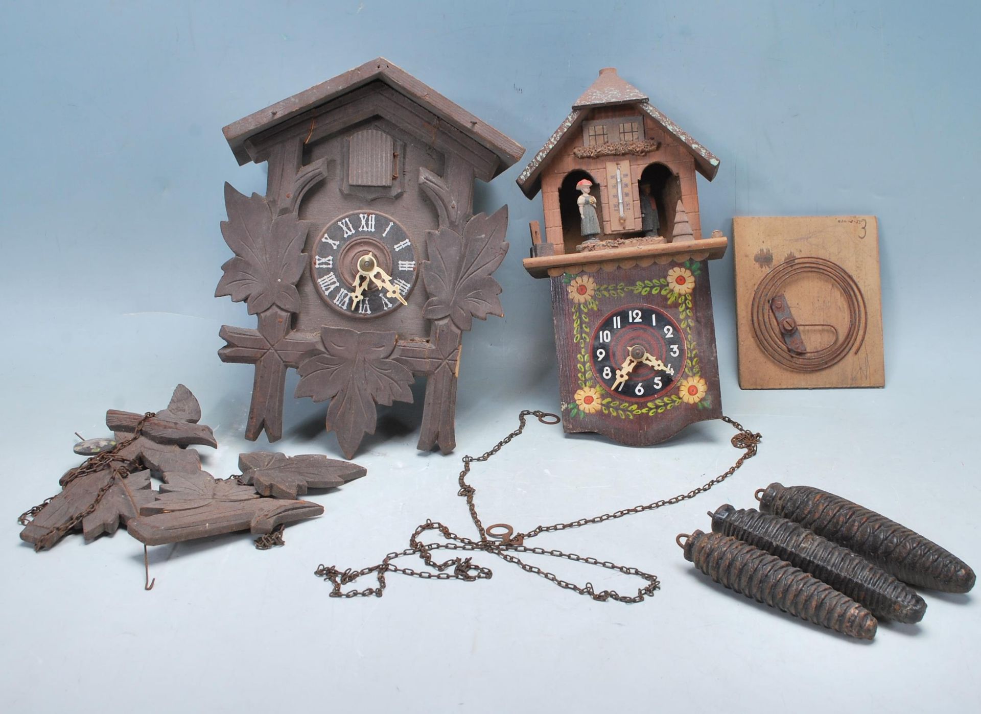 TWO EARLY 20TH CENTURY GERMAN BLACK FOREST CUCKOO CLOCKS