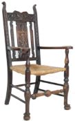 EARLY 20TH CENTURY ARTS AND CRAFTS CARVED OAK CHAIR IN THE MANNER OF DANIEL MAROT