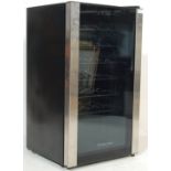 A BRUSHED STEEL AND GLASS RUSSELL HOBBS WINE COOLER