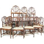 TWELVE GEORGE III STYLE MAHOGANY DINING CHAIRS AND TABLE