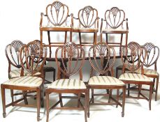 TWELVE GEORGE III STYLE MAHOGANY DINING CHAIRS AND TABLE