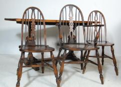 1920'S OAK REFECTORY DINING TABLE AND ARCHED BACK CHAIRS