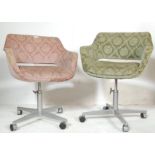 A PAIR OF RETRO 1960S SWIVEL / TUB CHAIRS UPHOLSTERED IN A DAMASK CHENILLE FABRIC.