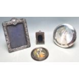 FOUR HALLMARKED STERLING SILVER PHOTOFRAMES