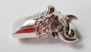 SILVER WHISTLE IN THE FORM OF A BULLS HEAD