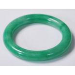 20TH CENTURY CHINESE JADE STYLE GREEN HARD STONE BANGLE