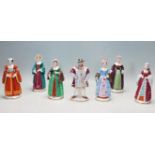 COLLECTION OF SEVEN SITZEDORF CERAMIC PORCELAIN FIGURINES OF HENRY VIII AND HIS SIX WIVES