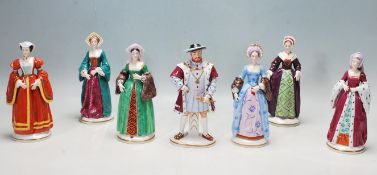 COLLECTION OF SEVEN SITZEDORF CERAMIC PORCELAIN FIGURINES OF HENRY VIII AND HIS SIX WIVES