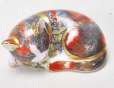 A ROYAL CROWN DERBY 'CATNIP KITTEN' PAPERWEIGHT.