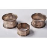 THREE ANTIQUE SILVER NAPKIN RINGS