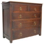 A 1930’S JACOBEAN REVIVAL 2 OVER 3 CHEST OF DRAWERS RAISED ON BRACKET FEET