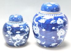 TWO ANTIQUE EARLY 20TH CENTURY CHINESE BLUE AND WHITE GINGER AND JARS