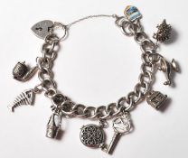 VINTAGE STERLING SILVER CHARM BRACELET