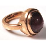 9CT GOLD AND STAR RUBY CABOCHON RING