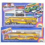 TWO ORIGINAL VINTAGE SIKU DIECAST CAR TRANSPORTER SETS