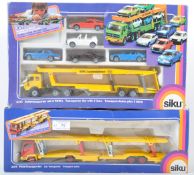 TWO ORIGINAL VINTAGE SIKU DIECAST CAR TRANSPORTER SETS