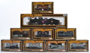 COLLECTION OF VINTAGE MAINLINE 00 GAUGE ROLLING STOCK WITH LOCO