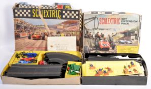 TWO ORIGINAL VINTAGE TRI-ANG SCALEXTRIC SLOT CAR RACING SETS