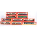 RAKE OF HORNBY 00 GAUGE ROLLING STOCK AND CARRIAGES