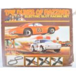 ORIGINAL VINTAGE DUKES OF HAZZARD ELECTRIC SLOT RACING SET