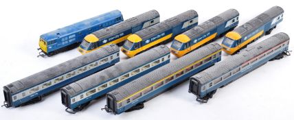 COLLECTION OF VINTAGE 00 GAUGE DIESEL ENGINES AND CARRIAGES