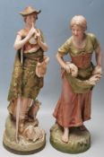 PAIR OF 20TH CENTURY ROYAL DUX CERAMIC FIGURINES