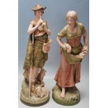 PAIR OF 20TH CENTURY ROYAL DUX CERAMIC FIGURINES