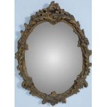 ANTIQUE VICTORIAN STYLE GILDED WALL MIRROR OF OVAL FORM