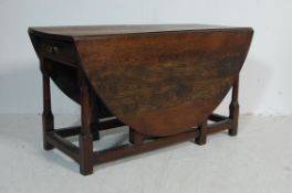 19TH CENTURY GEORGIAN OAK GATE LEG TABLE