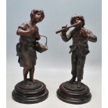 TWO 19TH CENTURY FRENCH BRONZED SPELTER FIGURINES - BOUQUETIERE - FLUTEUR - AFTER AGUST MOREAU