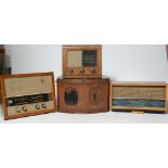 GROUP OF FOUR 1920’S AND LATER VALVE RADIOS IN WOODEN CASES