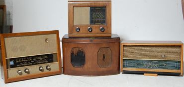 GROUP OF FOUR 1920’S AND LATER VALVE RADIOS IN WOODEN CASES