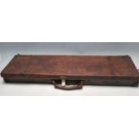 LATE 19TH CENTURY VICTORIAN BROWN LEATHER GUN CASE WITH WOODEN INTERIOR