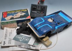 COLLECTION OF ASSORTED RC CONTROL CARS AND ACCESSORIES