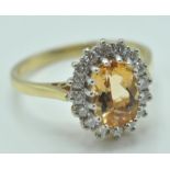 1970'S 18CT GOLD, TOPAZ AND DIAMOND RING