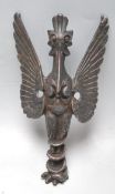 AN UNUSUAL 20TH CENTURY FIGURE IN THE FORM OF A WINGED ANIMAL / DEITY. SPELTER AND PEWTER.